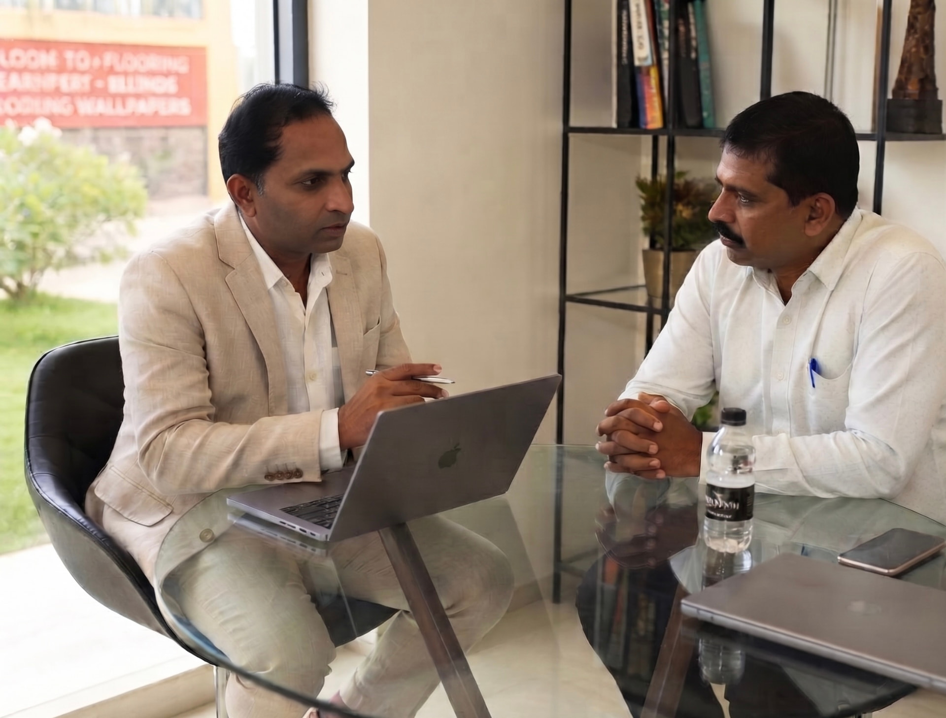 Retail consultant in a one-on-one discovery conversation with a store owner
